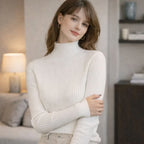 Woman wearing a white ribbed turtleneck sweater in a cozy living room setting